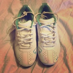 Puma aqua and silver and white sneakers
